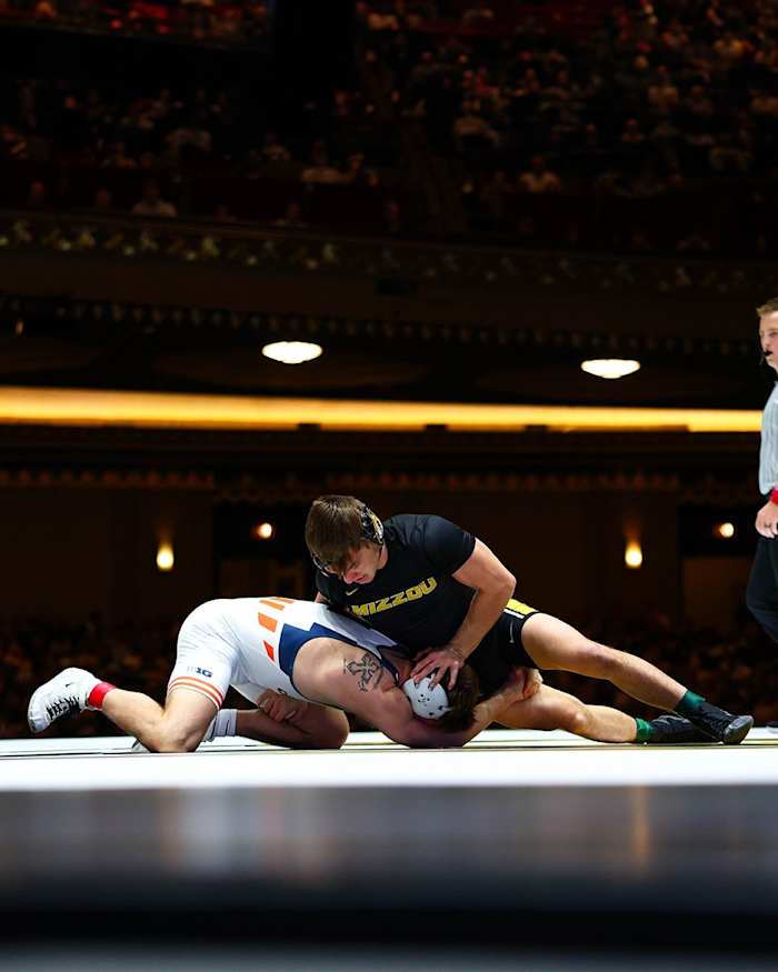 No. 9 redshirt senior Brock Mauller (149) in match against Illinois No. 30 Joe Roberts, Thursday, Dec. 21, 2023. Mauller defeated Roberts 14-5 MD.